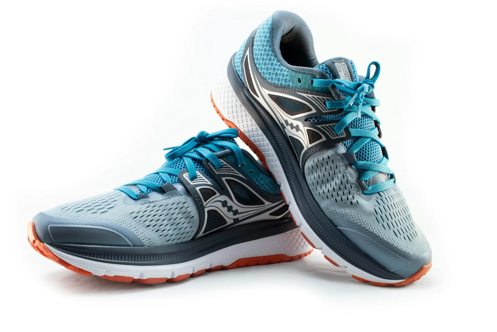 A pair of running shoes on a plain studio background