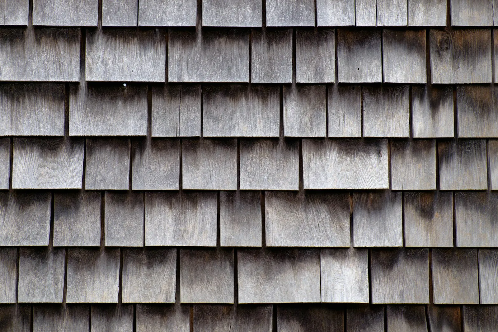Close-up texture of overlapping roof shingles